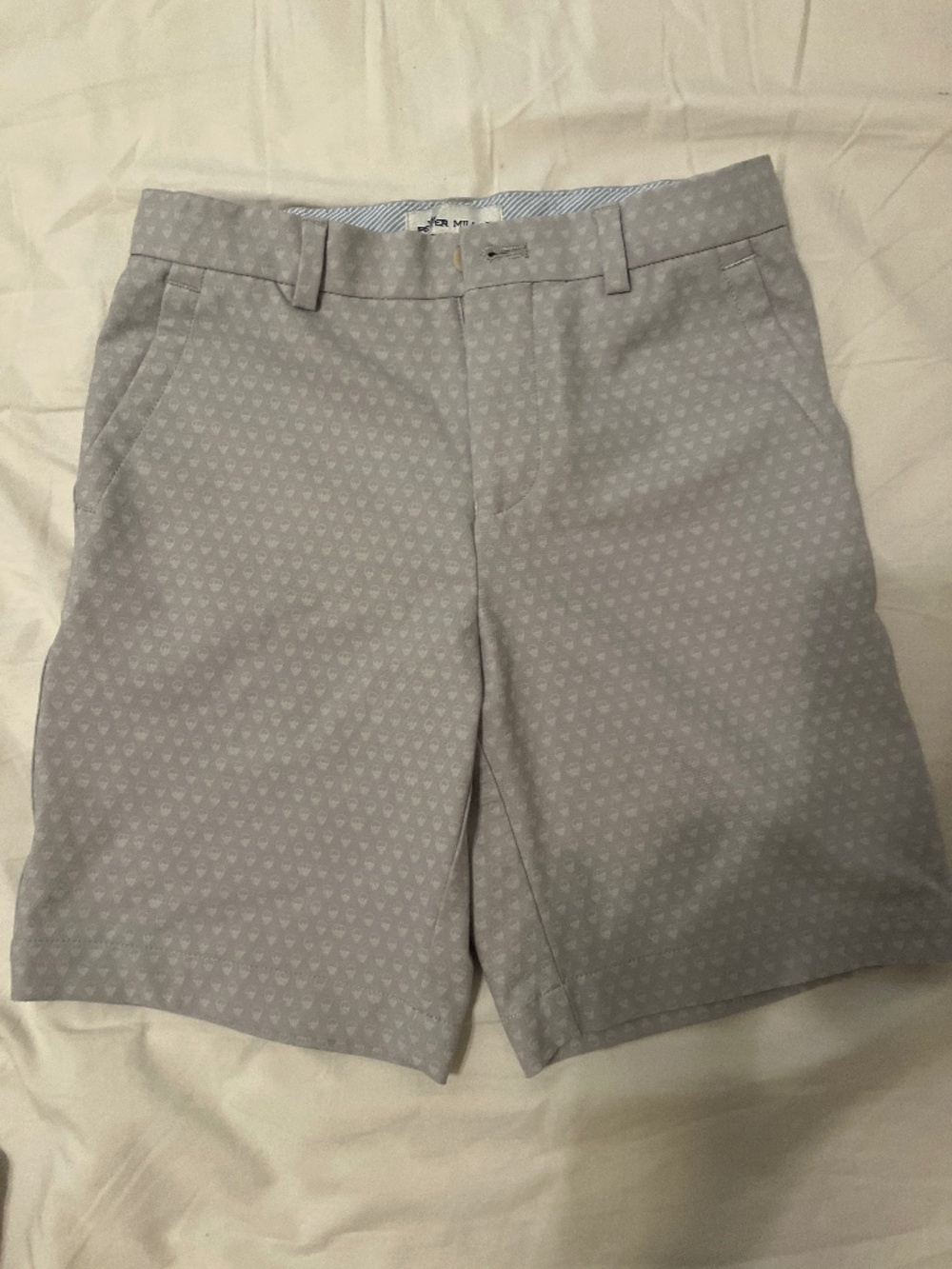 Boys Peter Millar performance shorts, grey skulls size small (7-8)